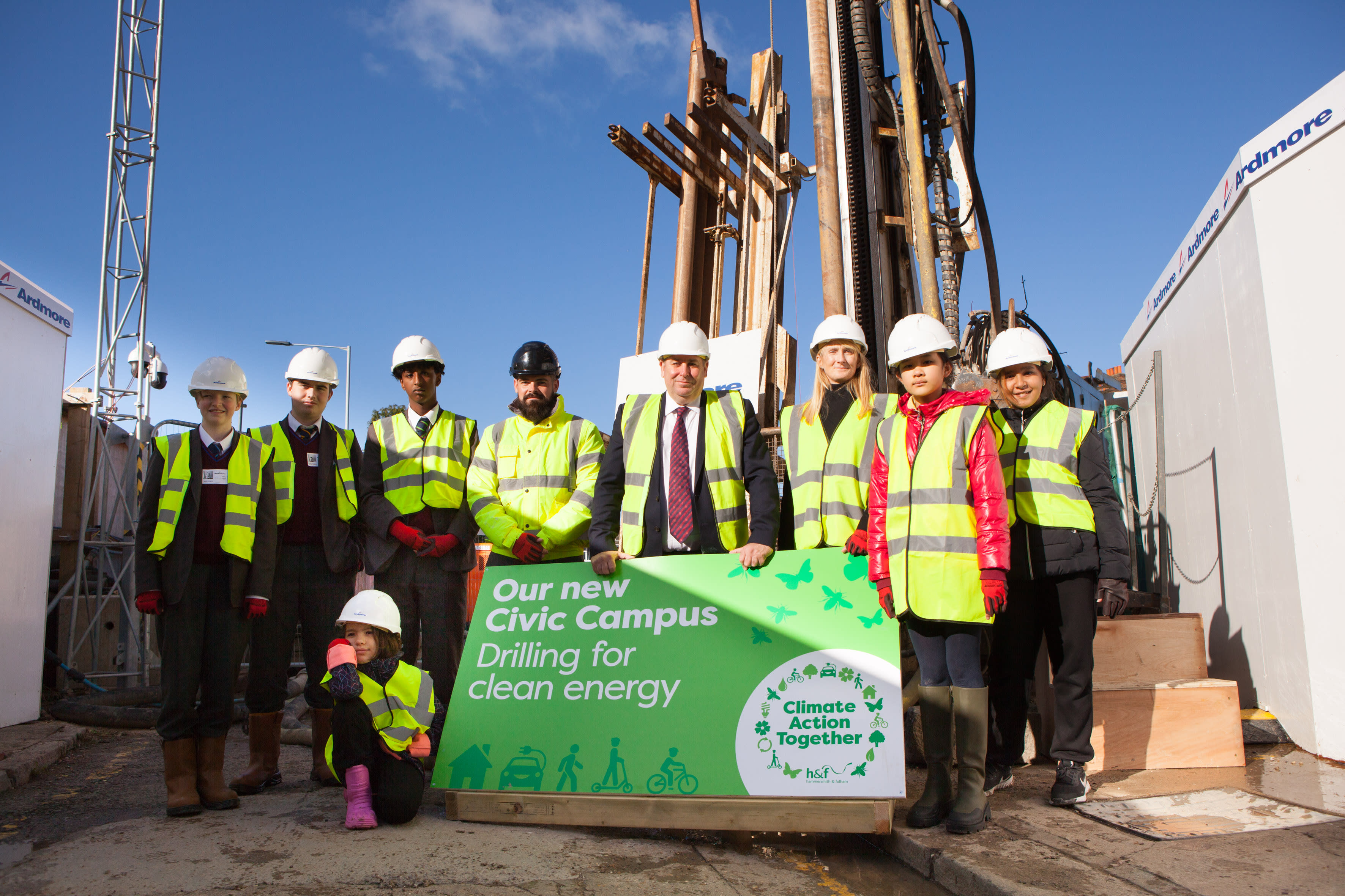 The leader of H&F Council, Cllr Stephen Cowan, is shown standing with a group of local schoolchildren at H&F's new Civic Campus in King Street, Hammersmith