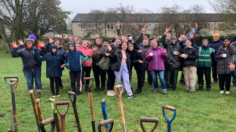 An image of community members in a park